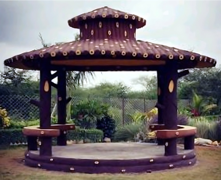 Stone railing sculpted to look like wood branches
